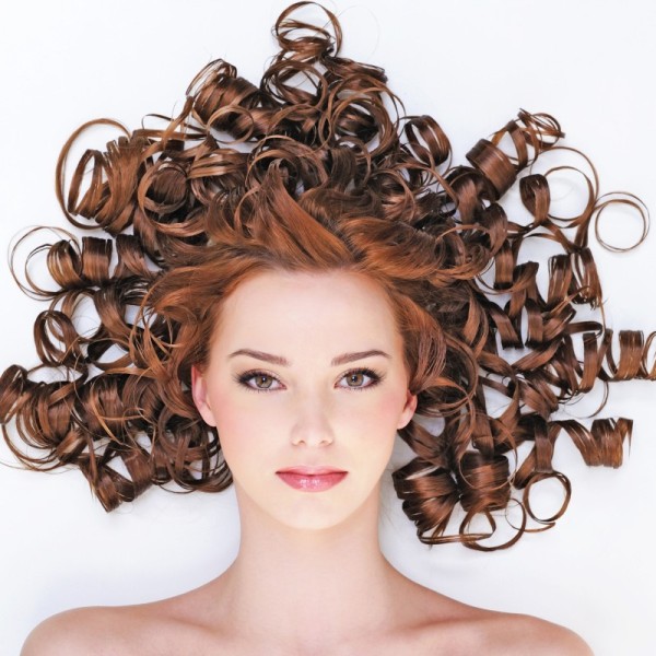 high-angle-portrait-pretty-young-woman-with-beauty-curly-hairs-lyinh-floor (1) (1)